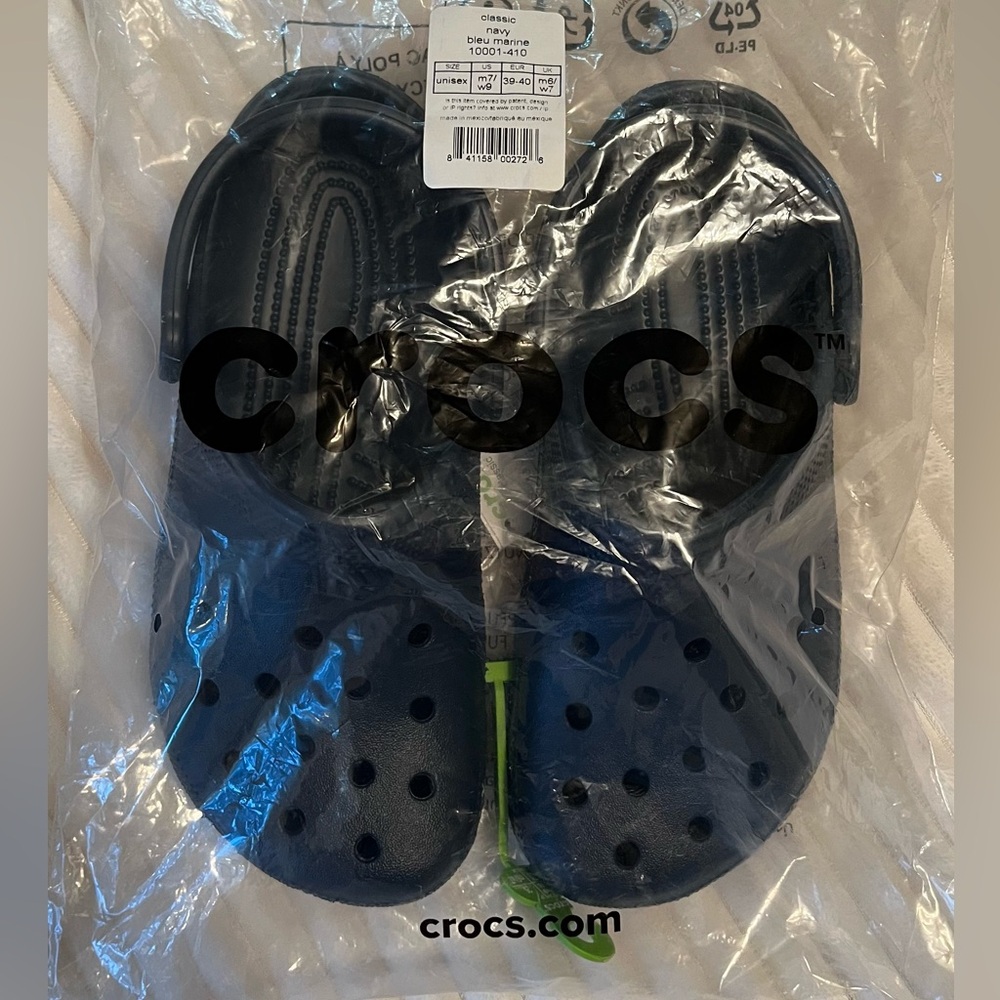 SOLD. CROCS Classic Navy Clogs Unisex